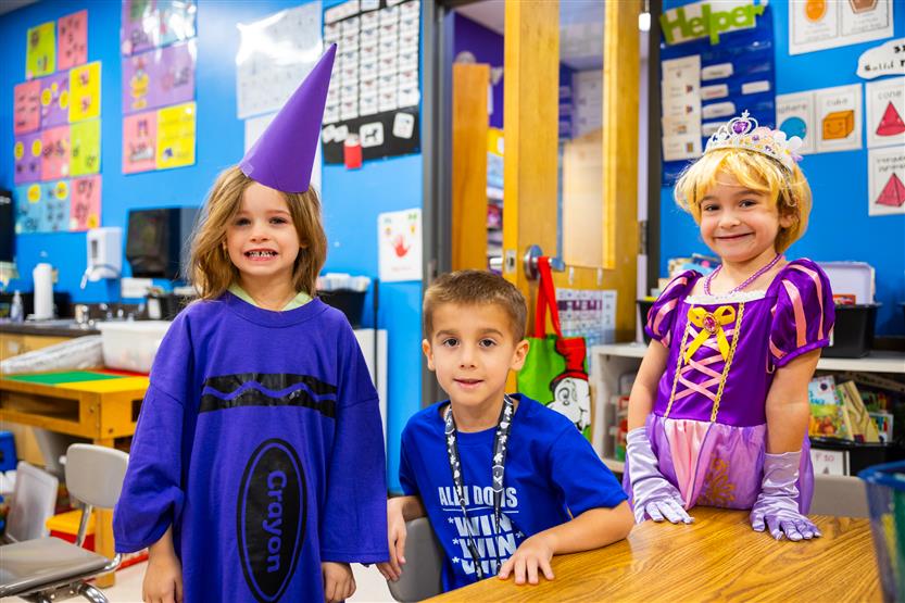 Students participate in an alphabet parade